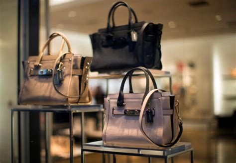 michael kors bought louis vuitton|Coach owner’s Michael Kors deal creates US giant to take on .